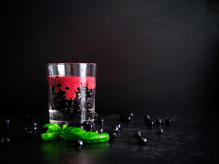 blueberry smoothie with mint on a dark background
