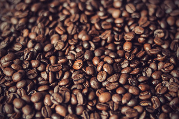 roasted coffee beans background texture, vintage filtered style
