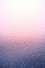 Blue ice on glass  in the sunlight,  background, texture