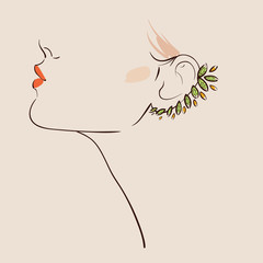 Beautiful woman wearing earrings