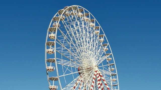 Huge Classical Fair Ferris Wheel In France.
Ferris wheel on the banks of the Garonne River in Toulouse, France.
Fair Ferris Wheel spinning at sunset.
Fairground in France.
