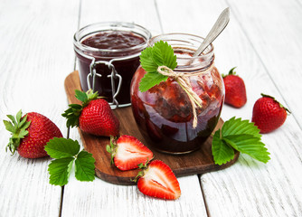 Strawberry jam and fresh strawberries