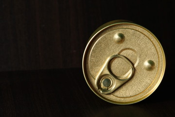 Aluminum can lid with pull ring.