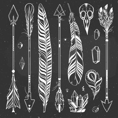 Bohemian set on a chalkboard. Vector ornamental feathers, arrows and crystals, boho style.