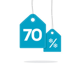 Obraz na płótnie Canvas Blue hanging price tag labels with 70% and snowflake percent design texts on them and with shadow isolated on white background. For winter sale campaigns.