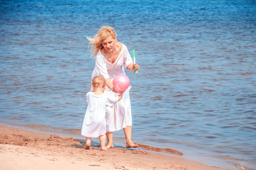 Happy family on the beach.