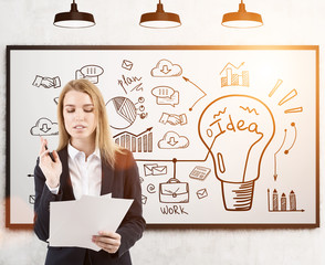 Woman with documents and idea on whiteboard, toned