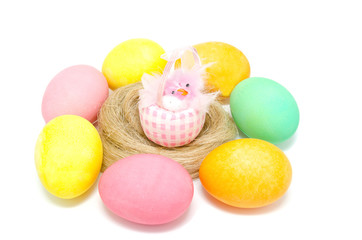 Colorful Easter eggs and little chick