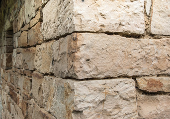The old wall built of stones storovynniy fortress, medieval