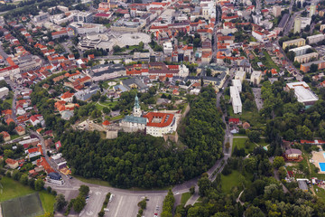 Aerial view of Nitra, Slovakia. Nitra castle in the foreground with city on the background - 136927688