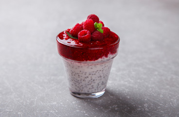 Yogurt with Fresh Raspberries and Chia seeds and mint.Concept Of A Healthy Breakfast.selective focus.