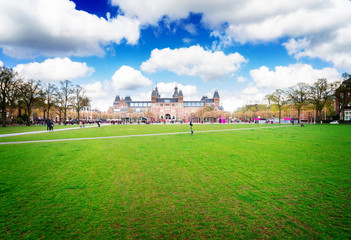 Obraz premium Rijksmuseum and spring green lawn, Amsterdam Netherlands, retro toned