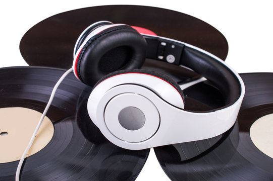 big headphones on three vinyl side view