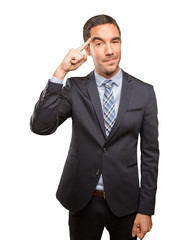 Young businessman doing a concentration gesture