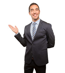Happy young businessman welcoming