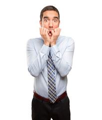 Nervous young businessman posing