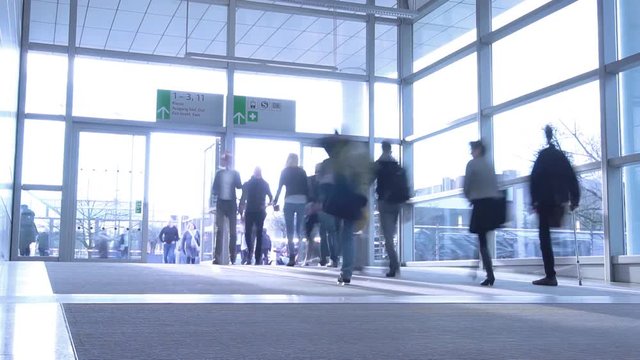 blurred people at a modern hall