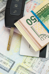 Fototapeta premium American money, credit cards and car key lies on thr top of the