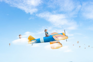 Woman in drawn airplane . Mixed media