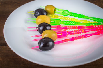 olives on plastic sticks