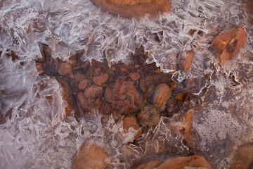 Frozen river in the Natural Bridges National Monument in winter, USA