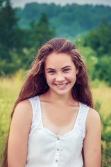 Beautiful girl in a field.