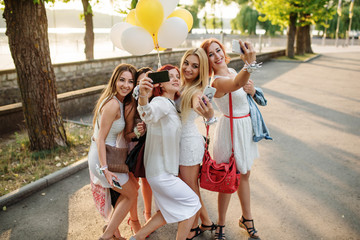 Group of girls making selfie at hen party.