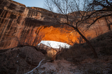 Frozen river in the Natural Bridges National Monument in winter, USA
