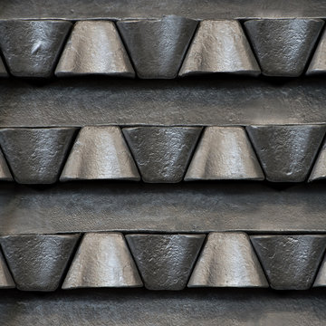 Stack of raw aluminum ingots in aluminum profiles factory