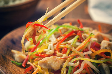 Stir fry chicken meat with vegetables and sprouts 