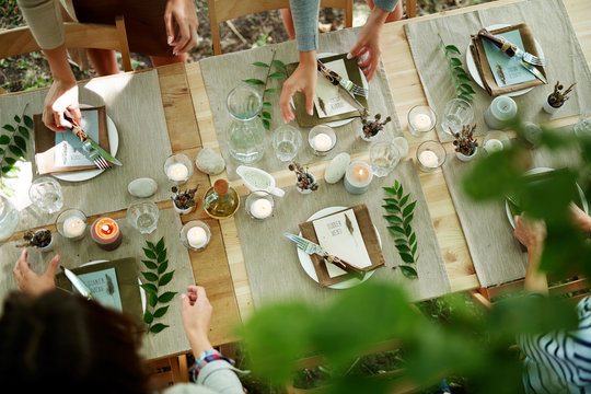 Top-view of served table with burning candles