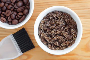 Homemade sugar, olive oil and ground coffee face and body scrub. DIY cosmetics