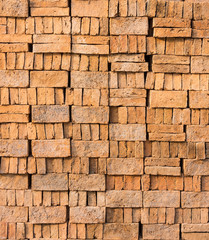 Pattern and texture of brick block piles. They are materials for construction work.