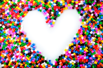 Full Color Beads On White Background, Close Up.