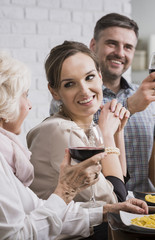 Smiling family making a toast