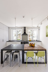 Two different tables in kitchen