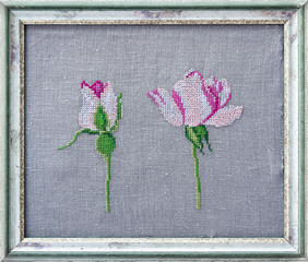Cross stitch roses. Framed embroidery.