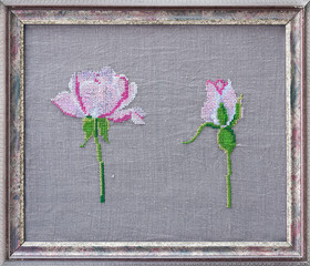Cross stitch roses. Framed embroidery.