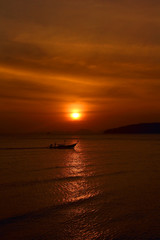 Fototapeta na wymiar Longtail boats on sunset