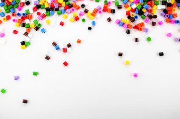 Full Color Beads On White Background, Close Up.