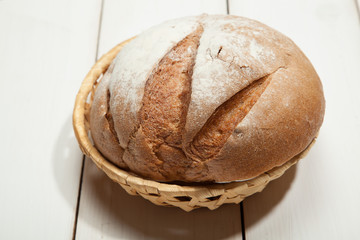 Bread on a white wooden background