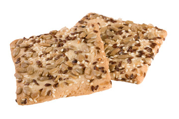 crispy bread with seeds of sunflower, flax and sesame seeds Isolated on white background