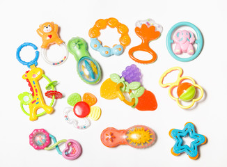 Set of plastic toys for newborn isolated on white