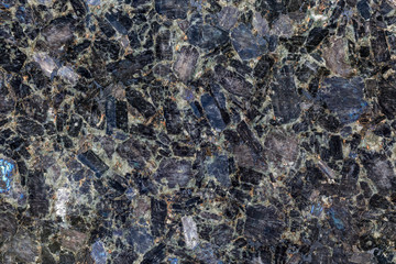 Black marble stone background.