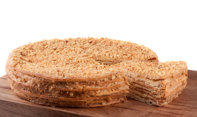 napoleon cake on a cutting board isolated white background