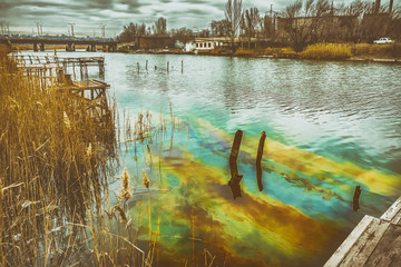oil pollution of the river, landscape of the industrial disaster
