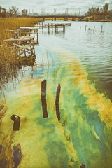 oil pollution of the river, landscape of the industrial disaster