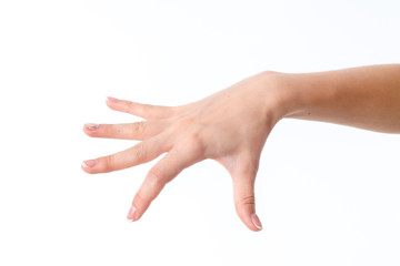 female hand outstretched to the side with a deployed down palms and fingers spaced isolated on...