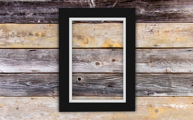 Black frame photo with a gap on the wood texture
