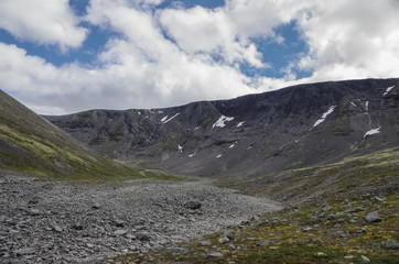 Mountain tundra with mosses and rocks covered with lichens, Hibiny mountains above the Arctic circle, Kola peninsula, Russia